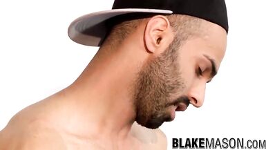 Good looking jock grabs his erect tool and wanks it off