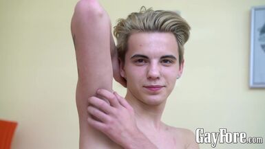 Pierced twink Mihail Filyakov jerking off large uncut dick