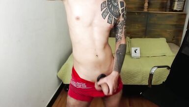 a beautiful boy masturbating on the web cam