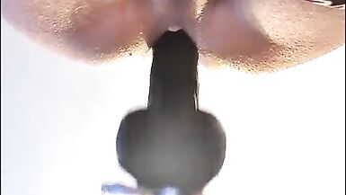 Fucking machine deep anal with black dildo - 2 image
