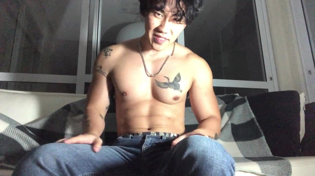 asian boy massaging muscles and jerking off