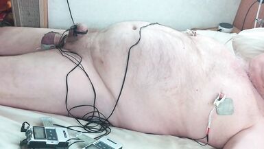 Hands free spunk fountain. Tied and stretched balls are swollen and shocked with estim along with nipps and cock