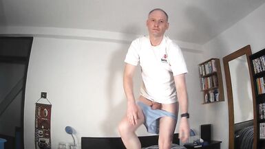 Kudoslong disrobes absolutely nude for the camera and wanks his hairless cock until it is vertical