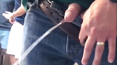 Men pissing in the nightclub