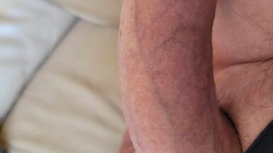 lies on the couch and jerks me off until the juice comes