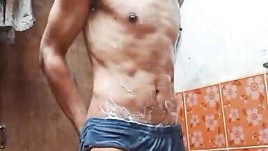 asian boy bathing naked in bathroom with cold water. her body is petite and sexy, her skin is brown and smooth.