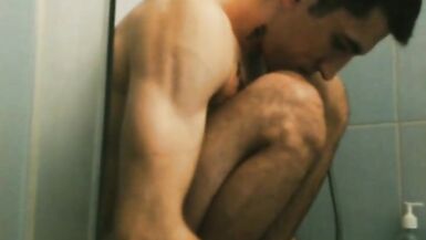 Spitting inexperienced athletic slender straight guy in tattoo takes a shower, washes his head legs penis in the bathroom toilet