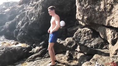 2 guys masturbation after each other t the sea-side