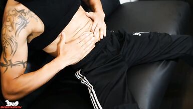 FX spreads his legs, lies back & jacks his cock